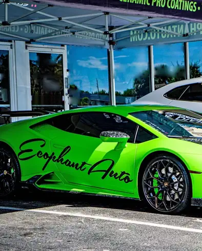 13 years in Boca Raton Green Lamborghini Huracan with Ecophant Auto livery in Boca Raton, Florida